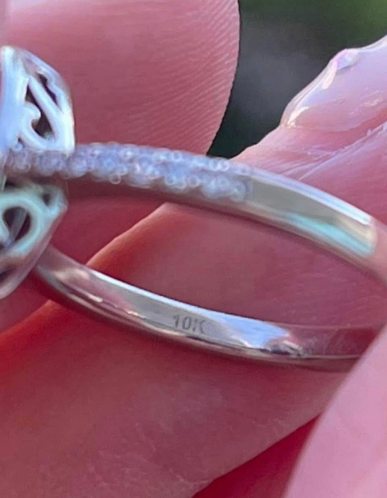 Modern 10ct white gold pear shape aquamarine diamond halo ring