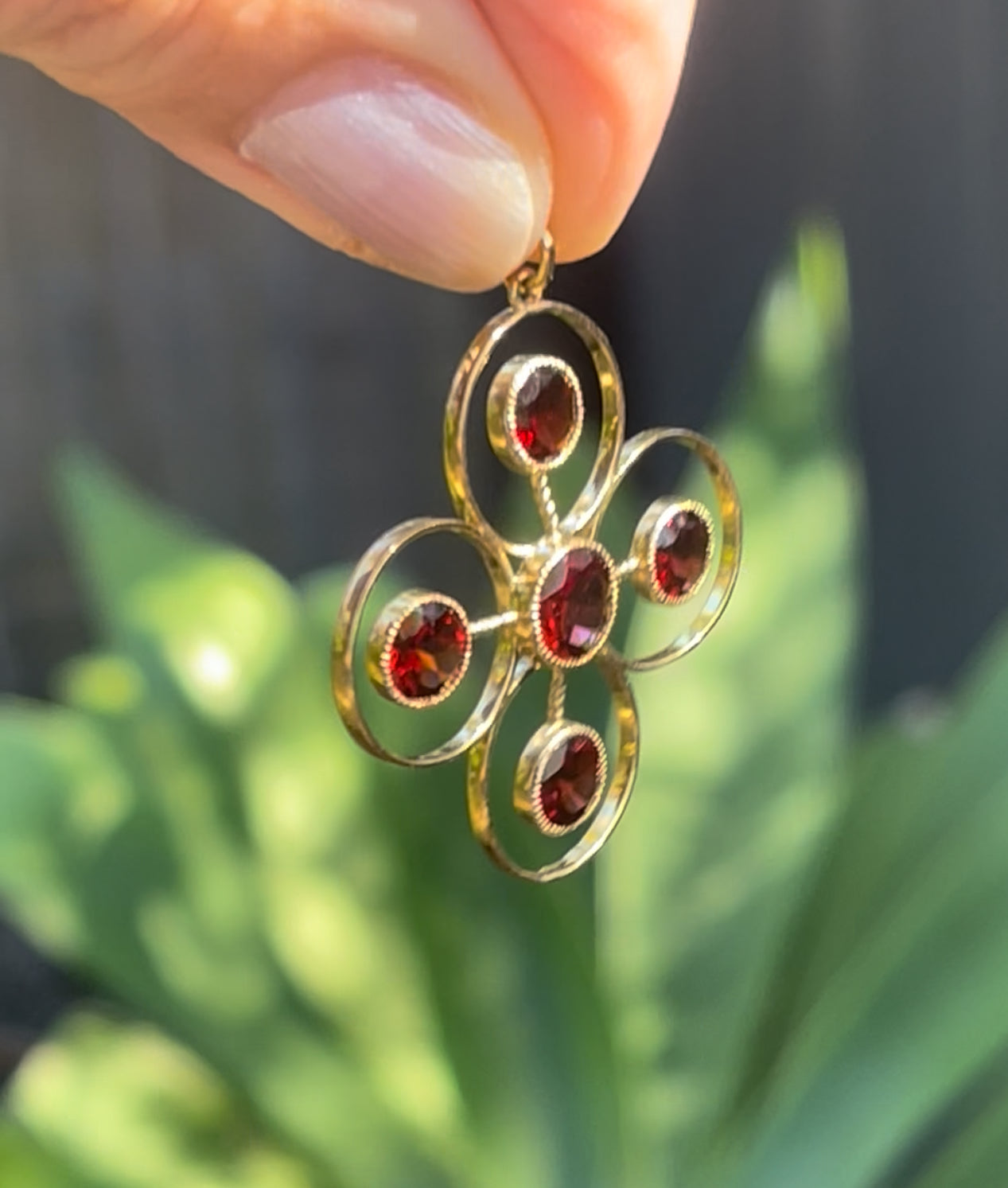 Statement 9ct yellow gold natural garnet pendant