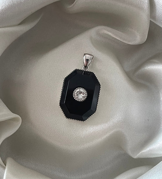 9ct white gold onyx pendant with 0.25ct natural diamond