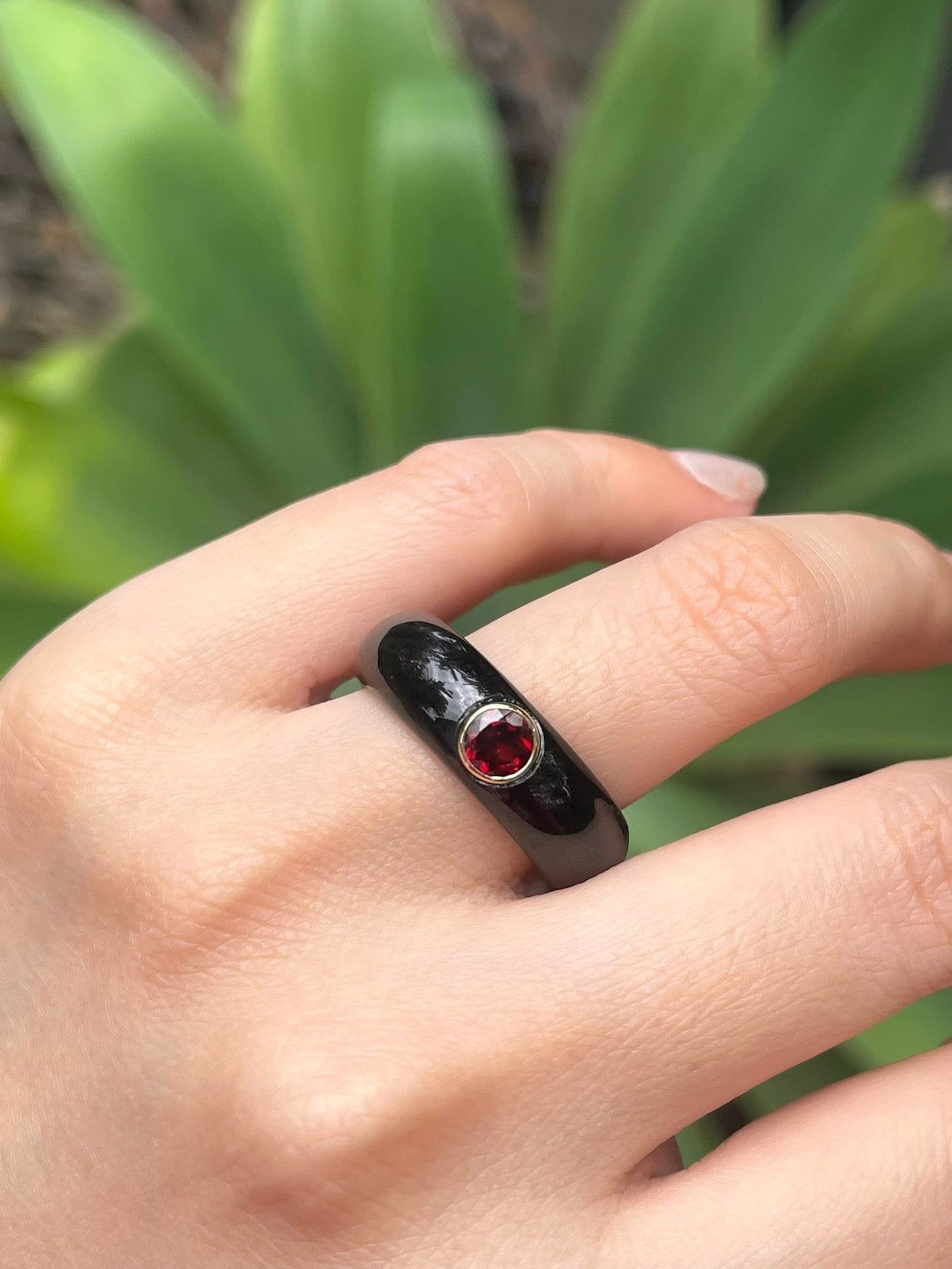 Natural black jade ring with earthy red garnet in 9ct yellow gold