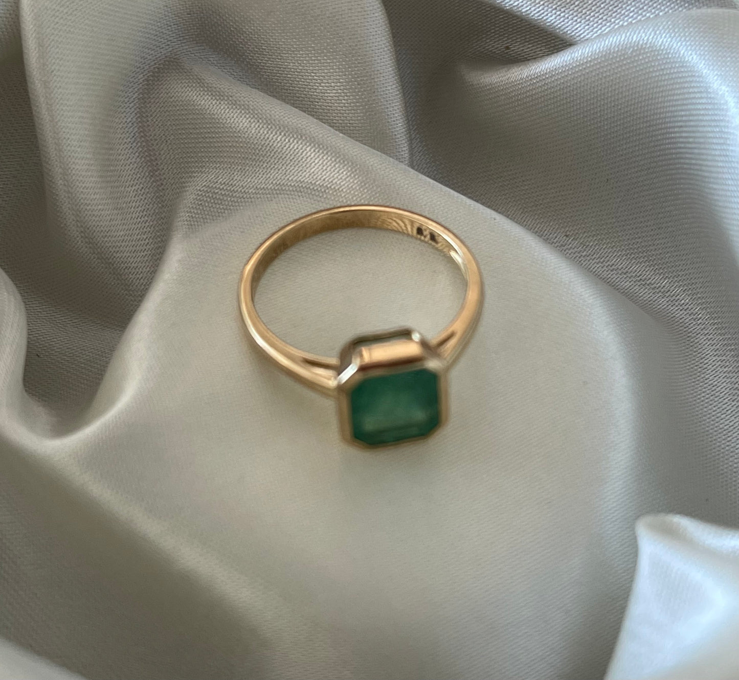 Custom 2.1ct natural emerald ring in bezel set
