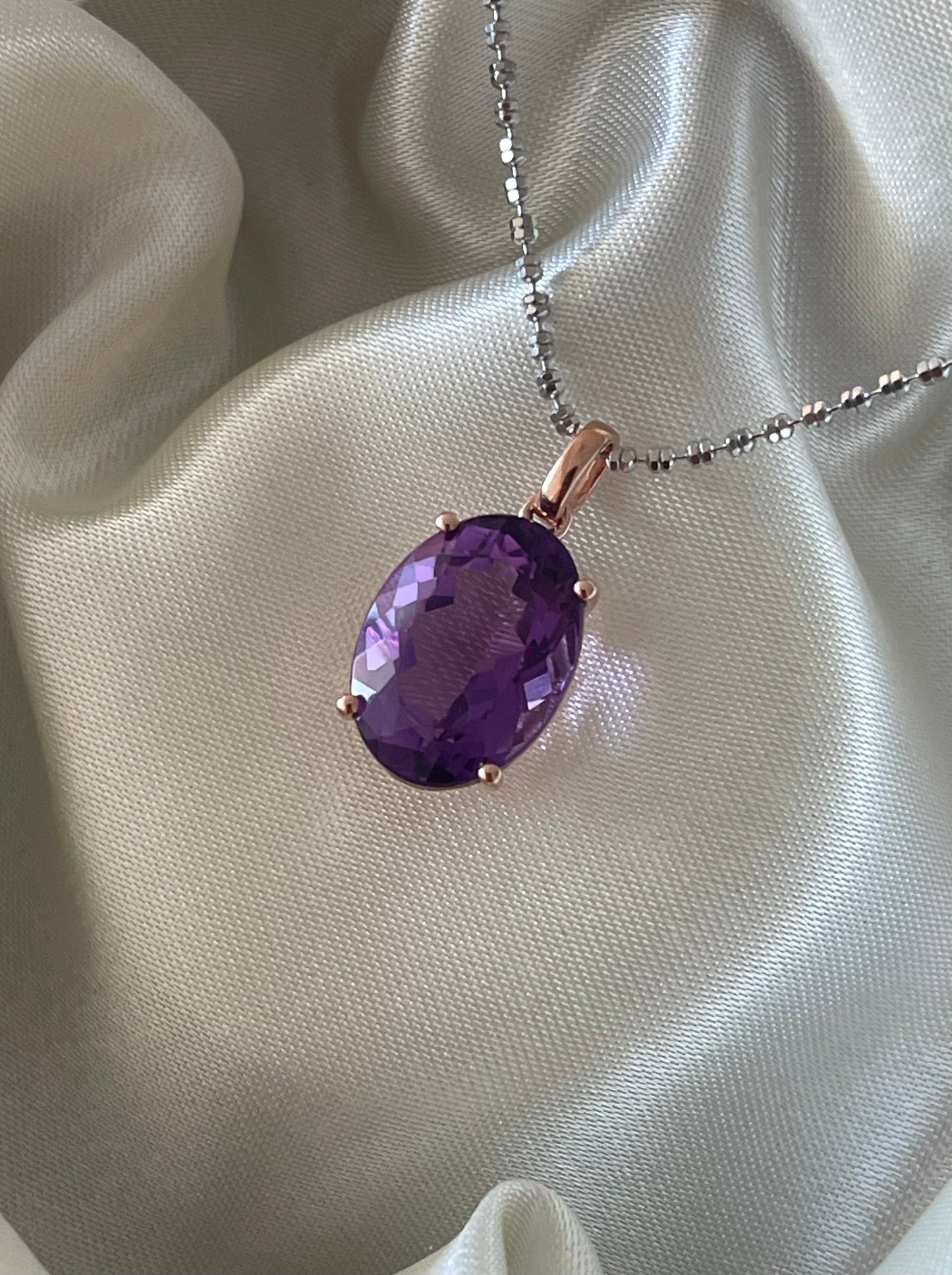 9ct rose gold 6.45ct oval natural purple amethyst pendant