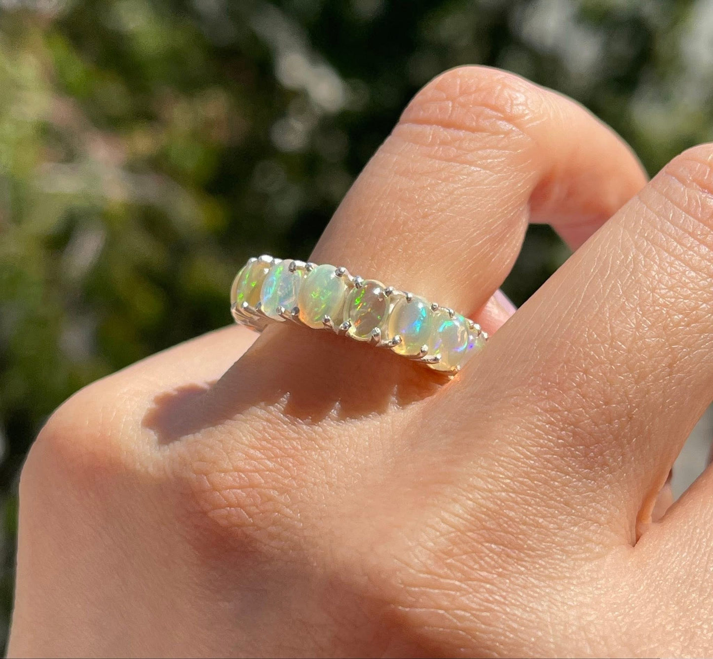 Natural solid opal eternity band set in sterling silver