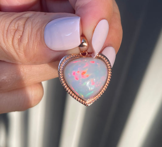 7.1ct Opal Pendant In 9ct Rose Gold milgrain frame