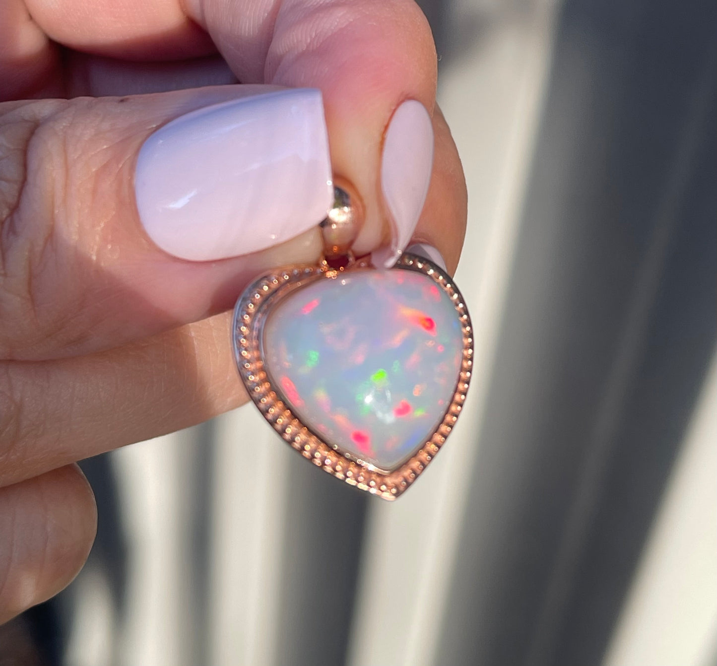 7.1ct Opal Pendant In 9ct Rose Gold milgrain frame