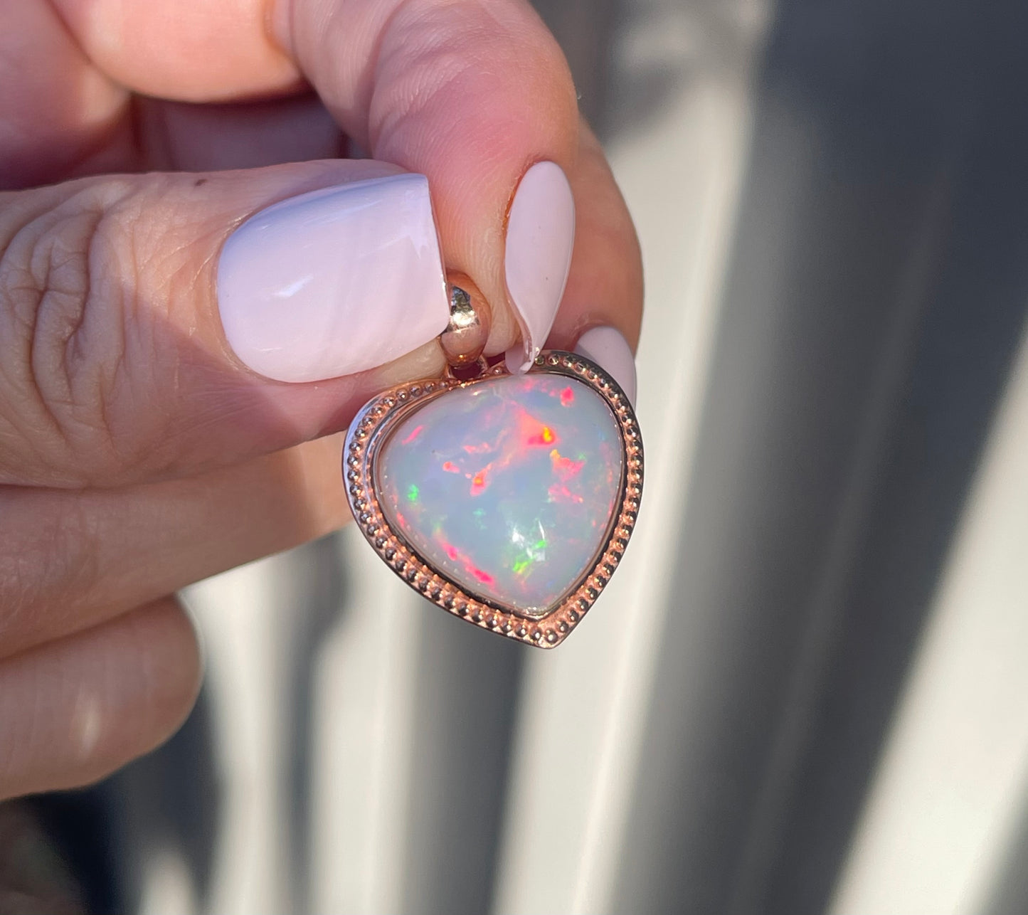 7.1ct Opal Pendant In 9ct Rose Gold milgrain frame
