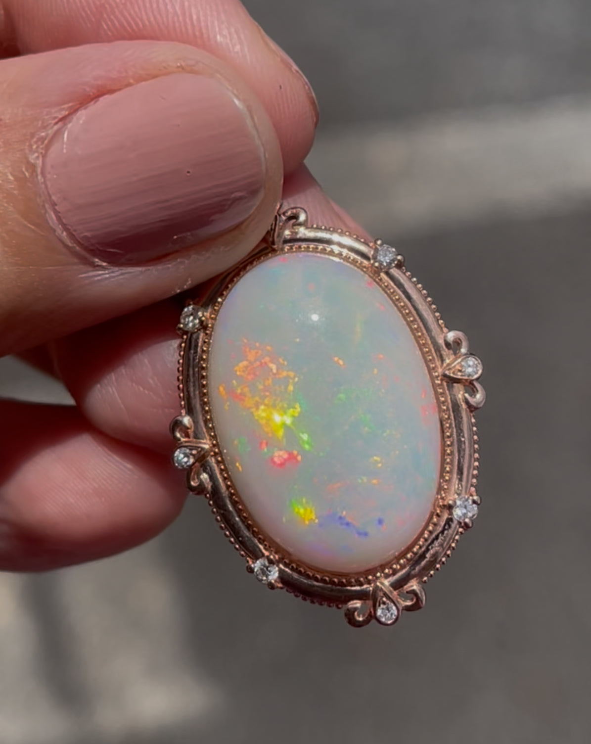 Bespoke 9ct rose gold 16ct natural opal pendant with diamonds