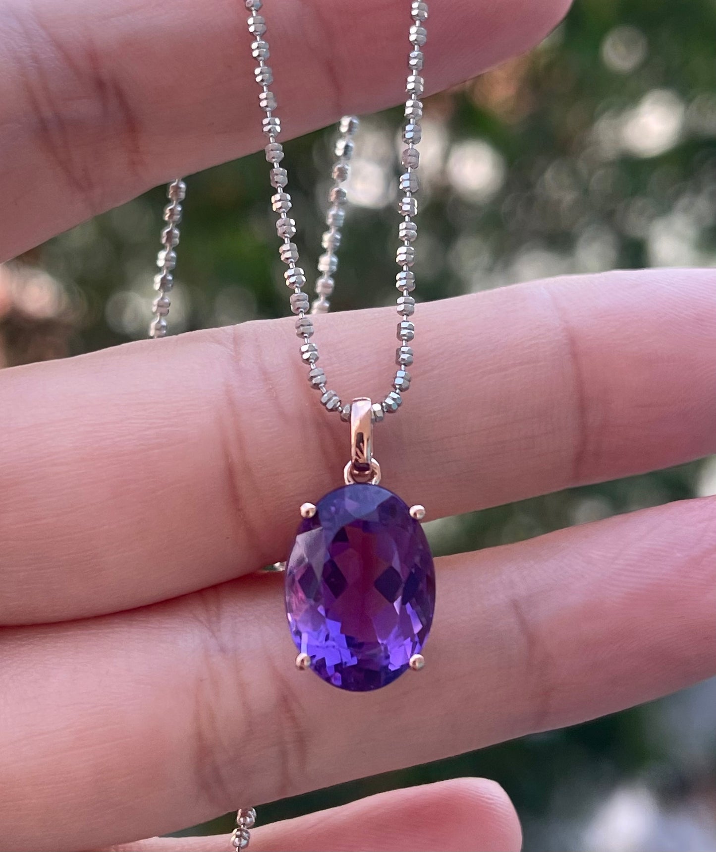 9ct rose gold 6.45ct oval natural purple amethyst pendant