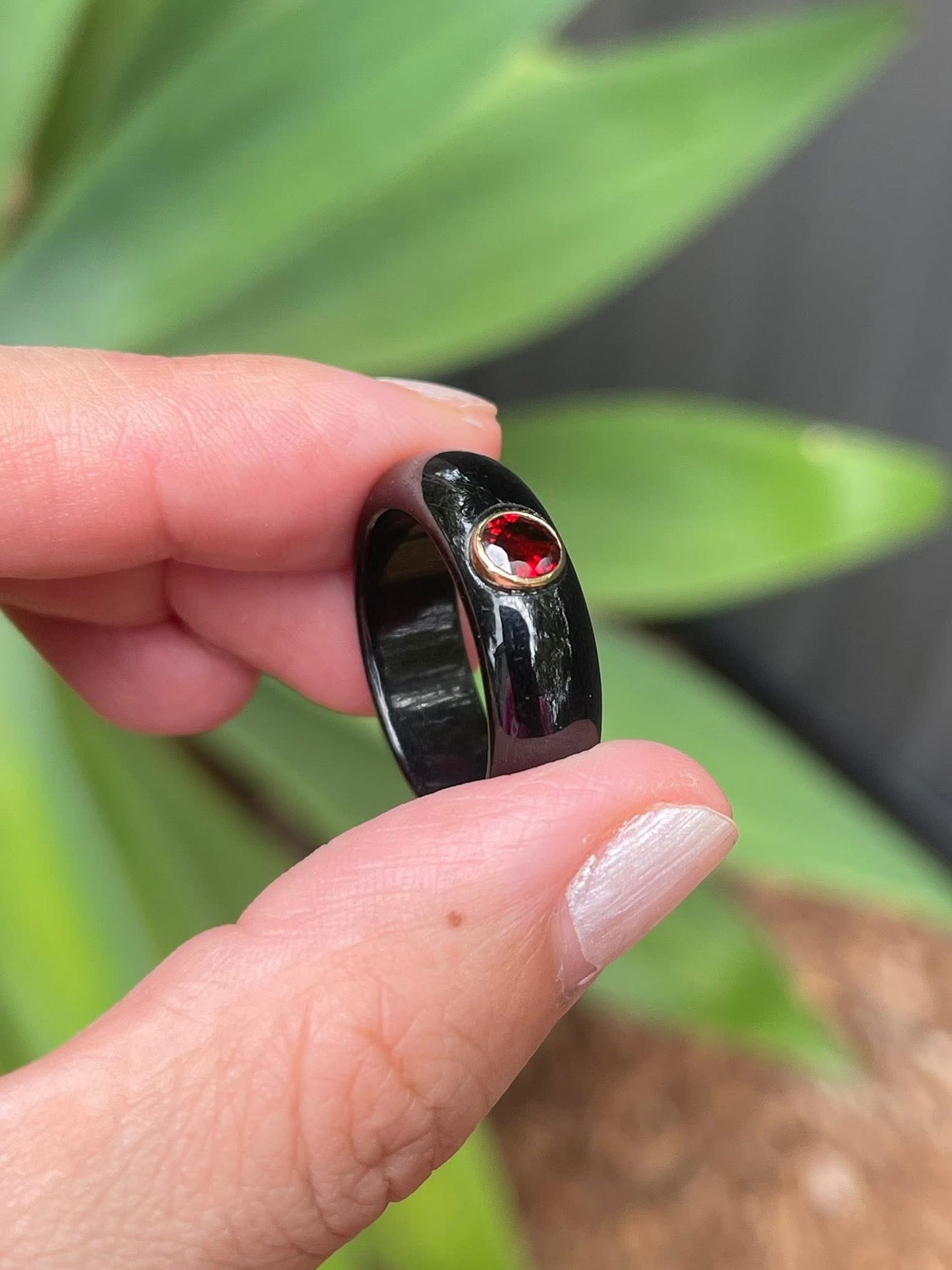 Natural black jade ring with earthy red garnet in 9ct yellow gold