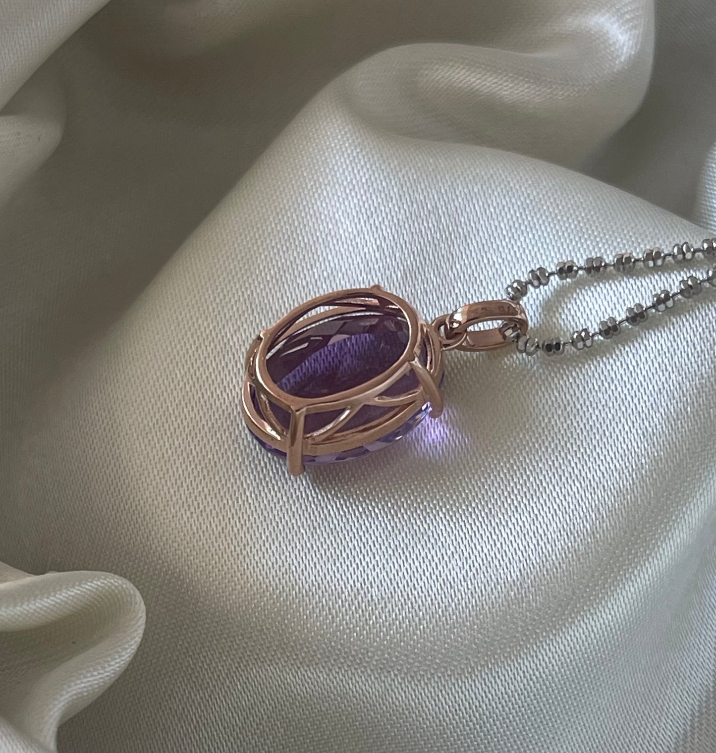 9ct rose gold 6.45ct oval natural purple amethyst pendant