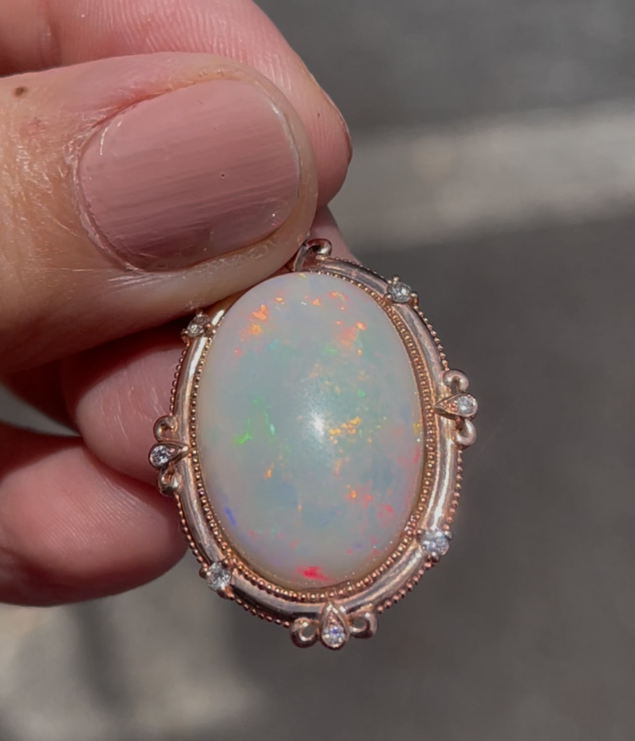 Bespoke 9ct rose gold 16ct natural opal pendant with diamonds