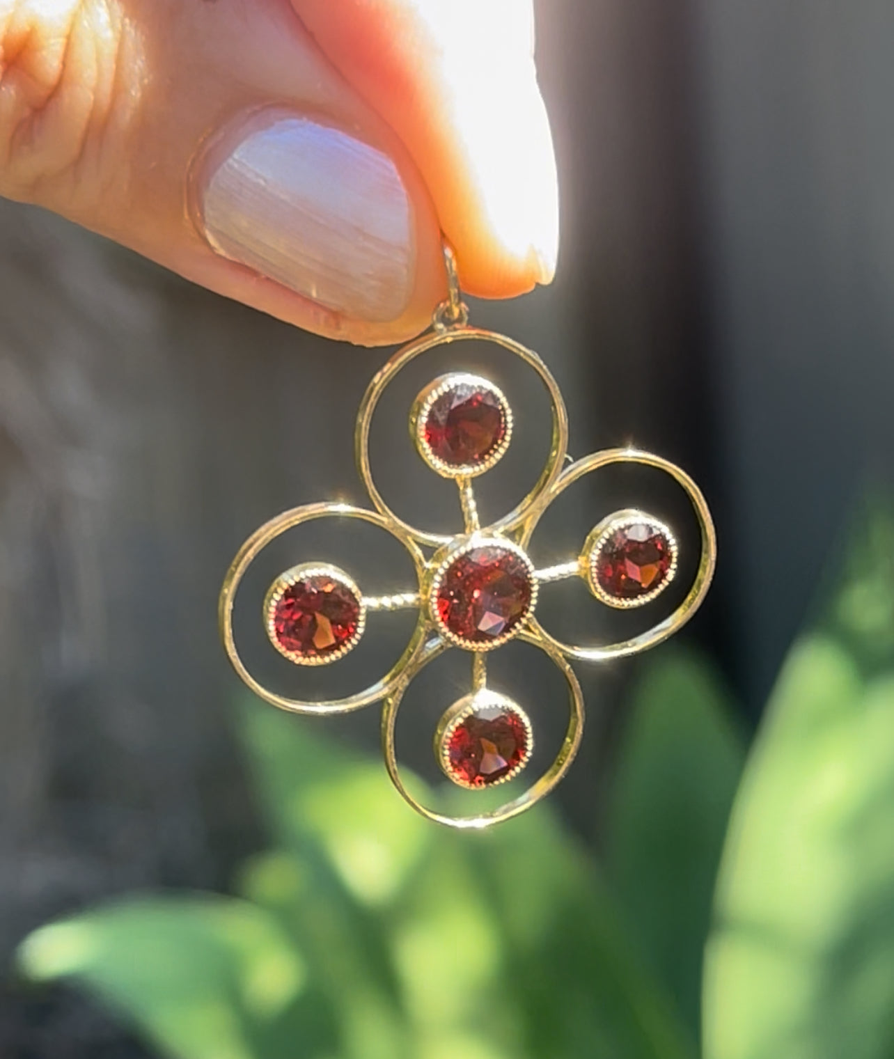 Statement 9ct yellow gold natural garnet pendant
