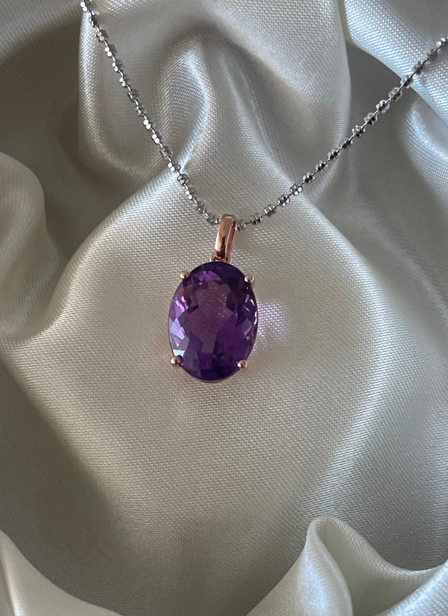 9ct rose gold 6.45ct oval natural purple amethyst pendant