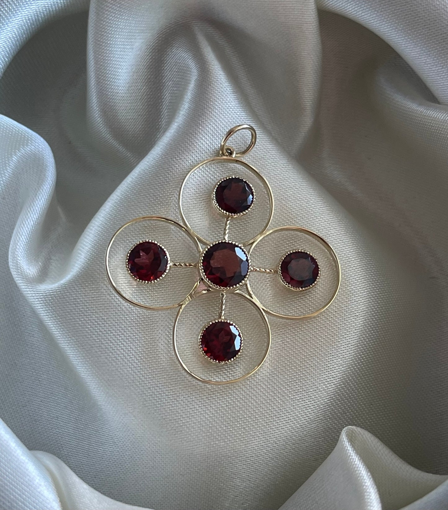 Statement 9ct yellow gold natural garnet pendant