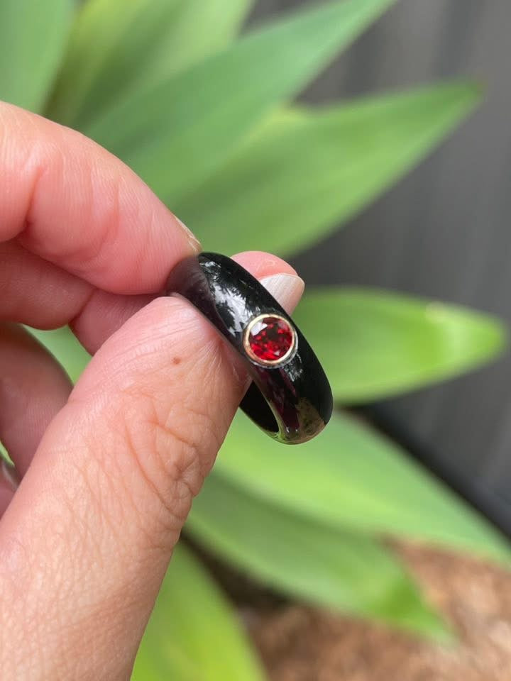 Natural black jade ring with earthy red garnet in 9ct yellow gold