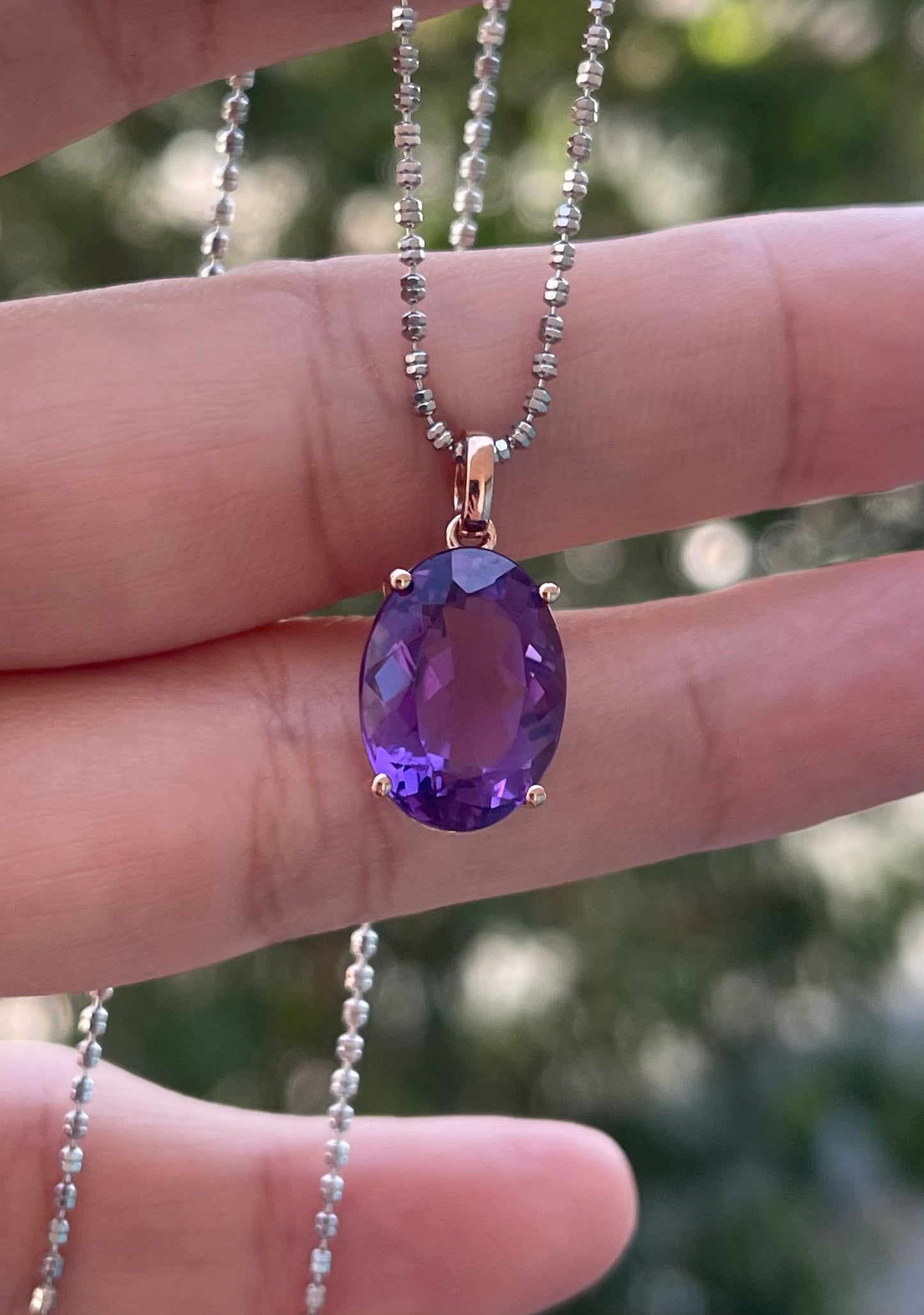 9ct rose gold 6.45ct oval natural purple amethyst pendant