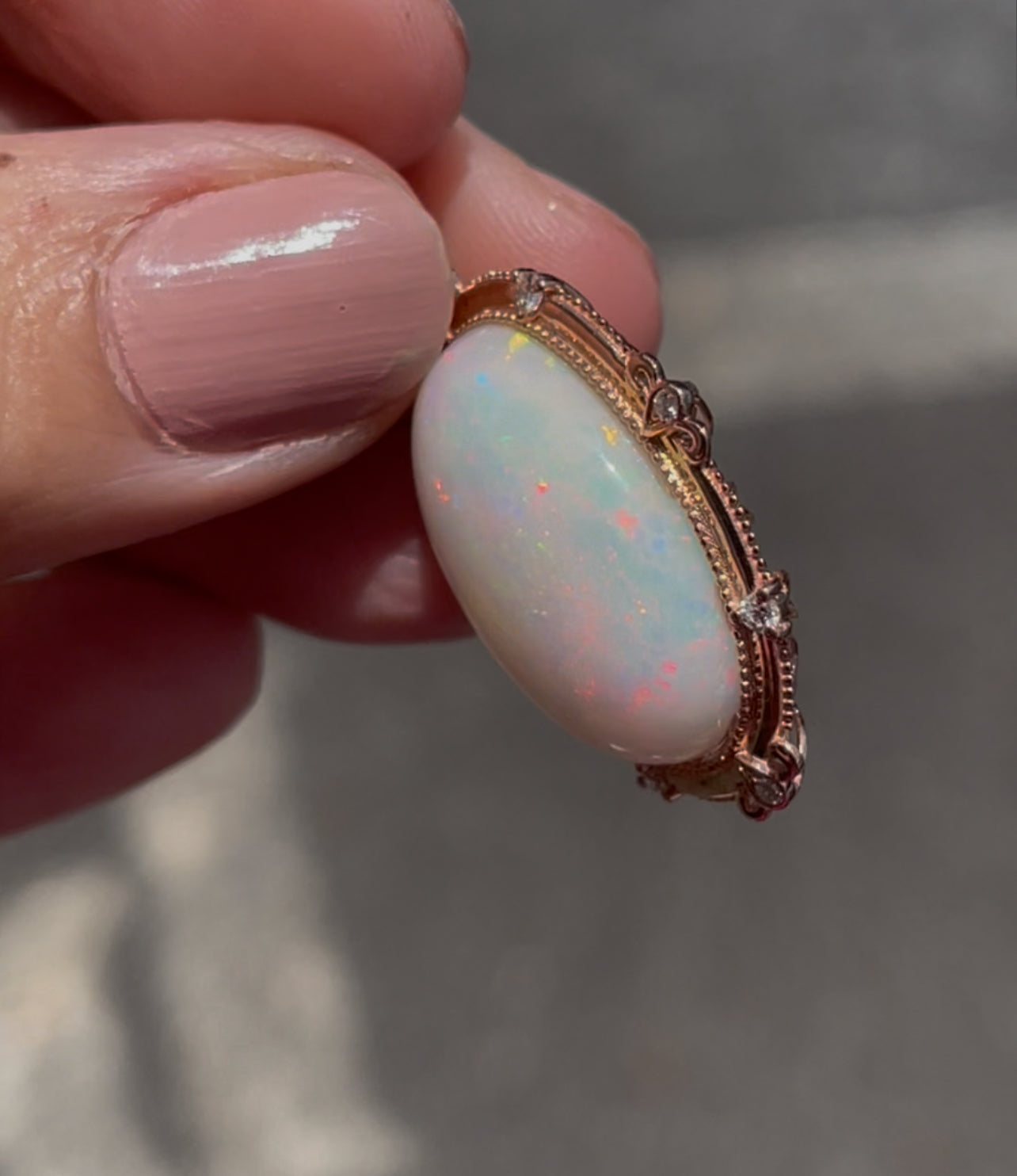 Bespoke 9ct rose gold 16ct natural opal pendant with diamonds