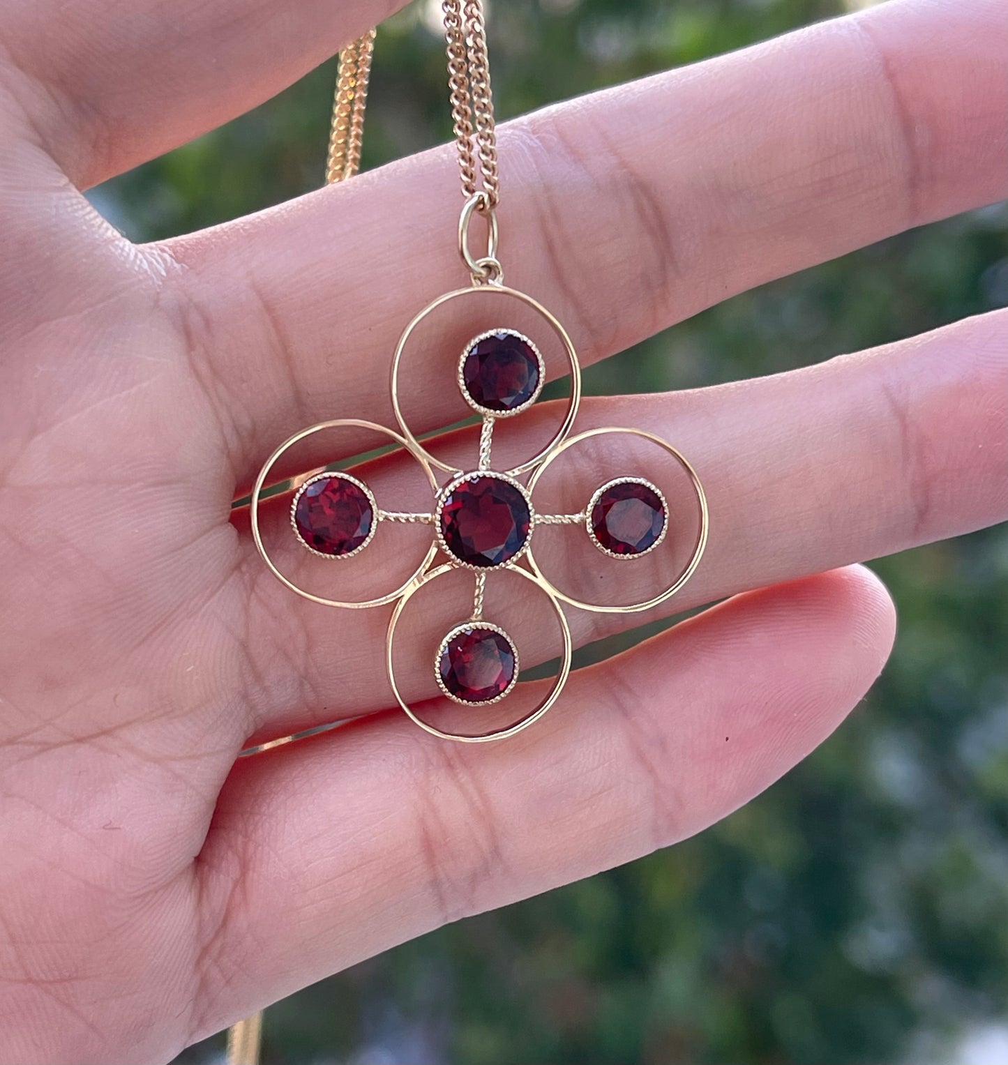 Statement 9ct yellow gold natural garnet pendant