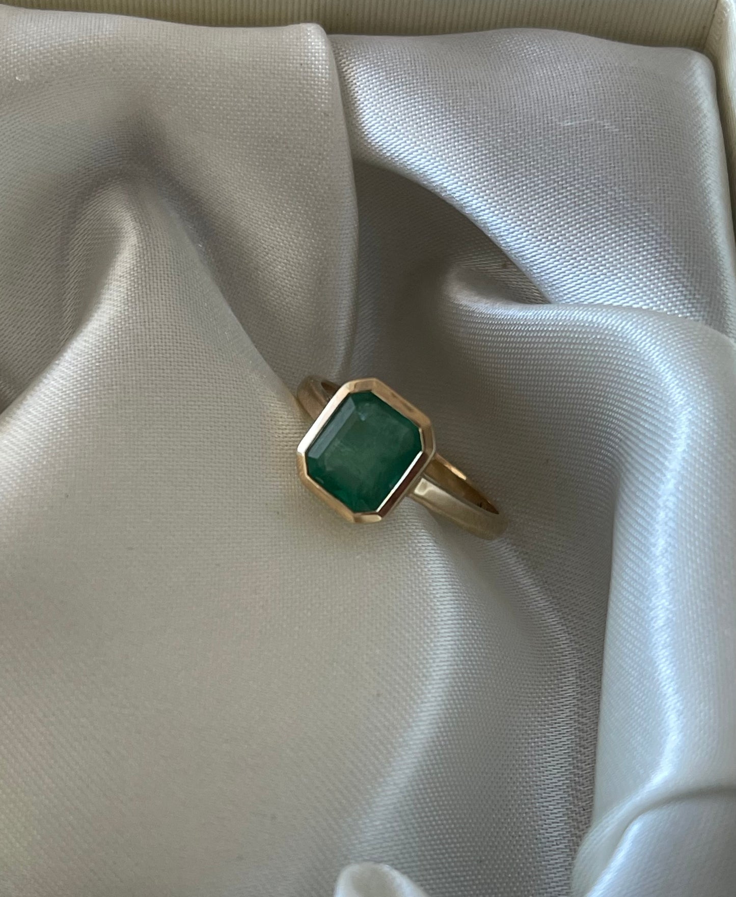 Custom 2.1ct natural emerald ring in bezel set