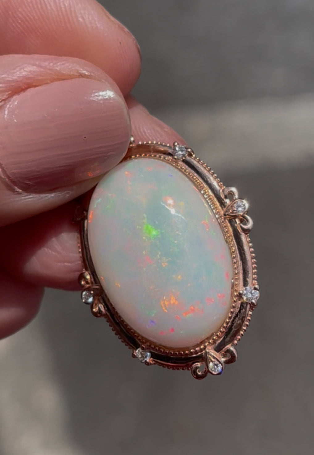 Bespoke 9ct rose gold 16ct natural opal pendant with diamonds