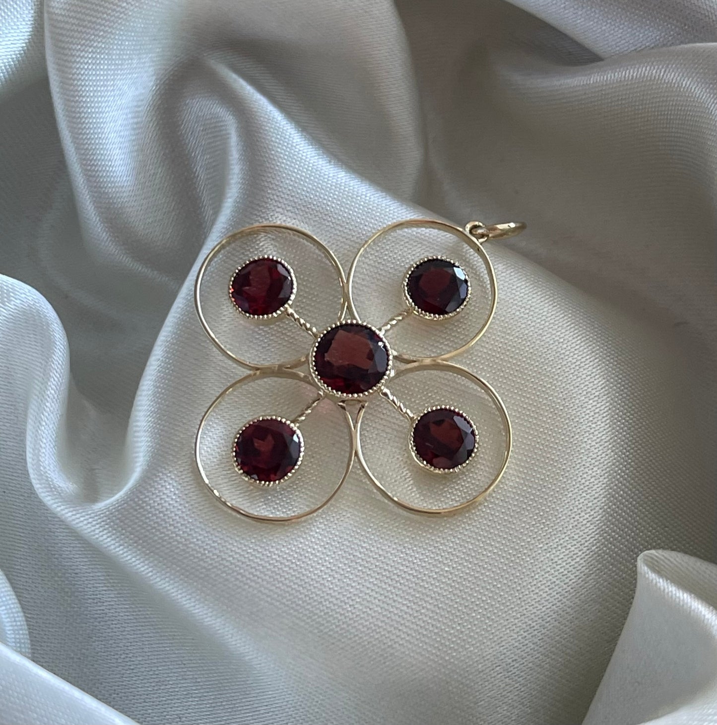 Statement 9ct yellow gold natural garnet pendant