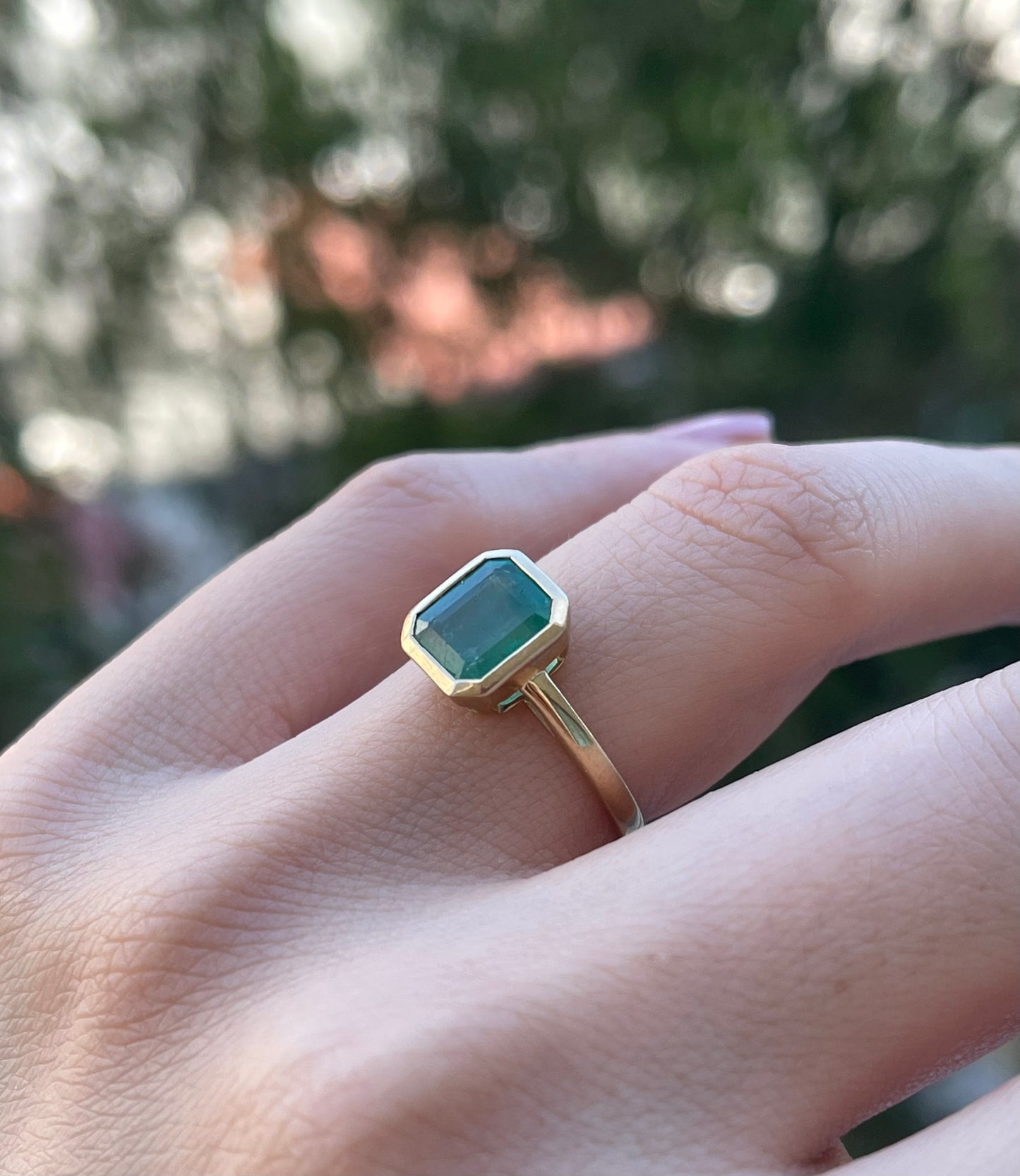 Custom 2.1ct natural emerald ring in bezel set