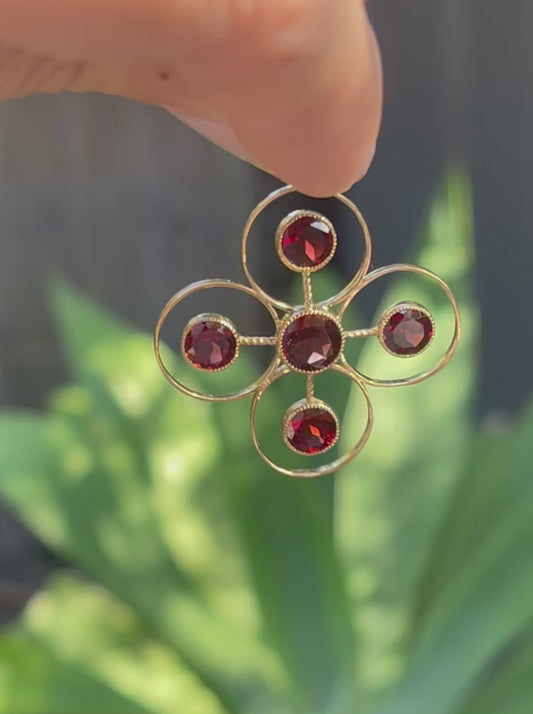 Statement 9ct yellow gold natural garnet pendant